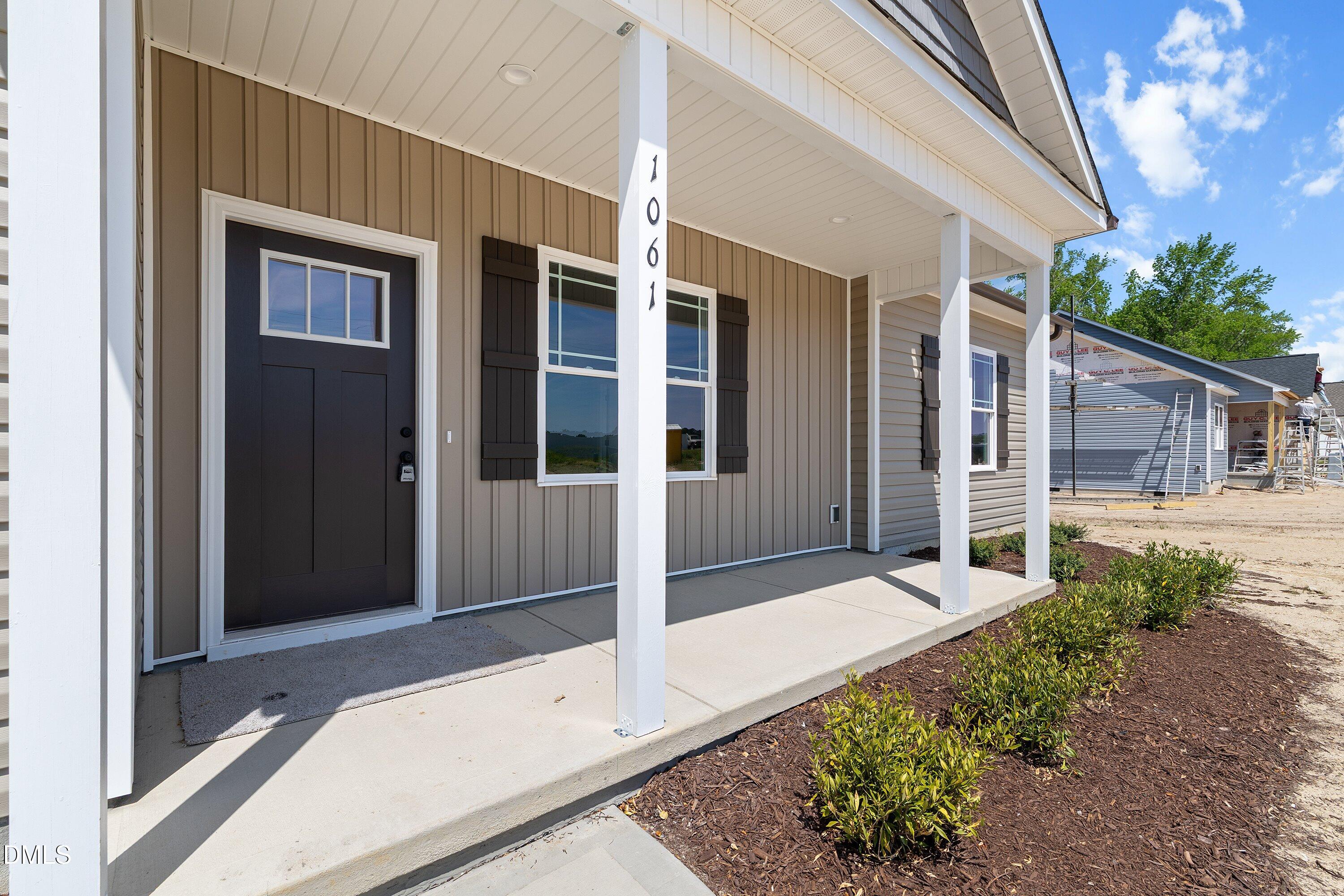 1061 Nor-Am Road Pikeville, NC 27863 - Photo 6 of 39 a view of house with a outdoor space