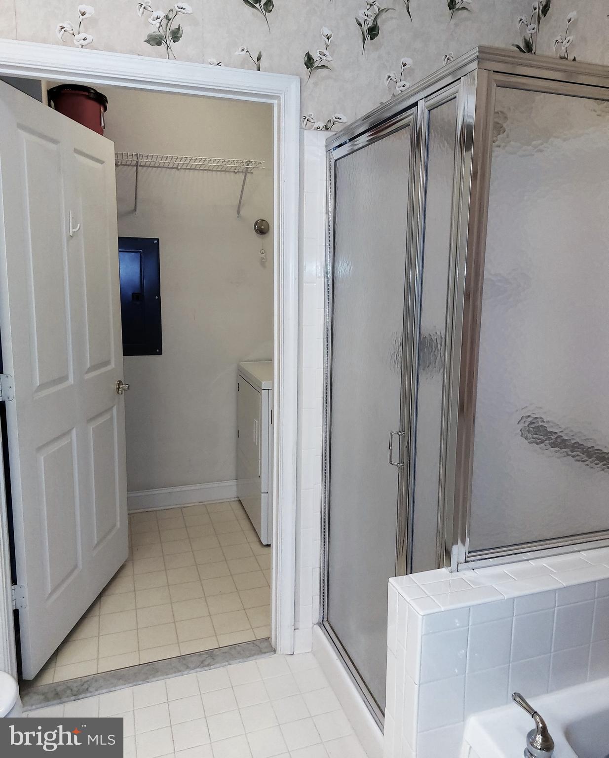 2500 Waterside Drive, Unit 306 Frederick, MD 21701 - Photo 16 of 23 laundry adjacent to primary bath