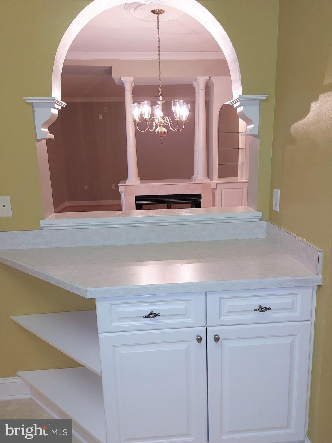 2500 Waterside Drive, Unit 306 Frederick, MD 21701 - Photo 8 of 23 pass through from kitchen to dining room