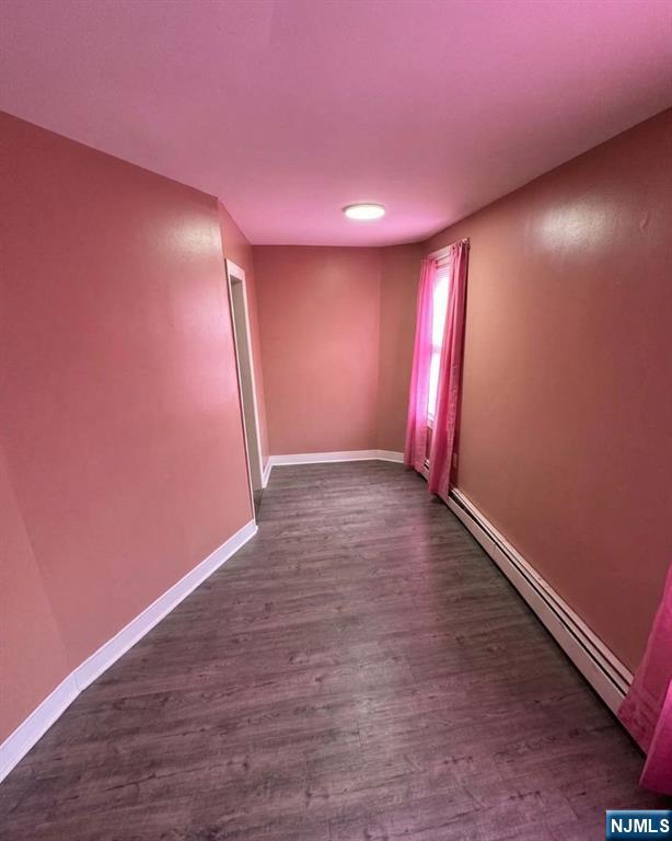 255 Franklin Street Elizabeth, NJ 07206 - Photo 19 of 34 an empty room with wooden floor and windows