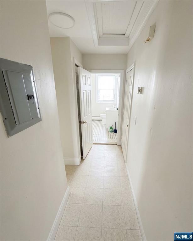 255 Franklin Street Elizabeth, NJ 07206 - Photo 9 of 34 a view of a hallway with wooden floor and a bathroom