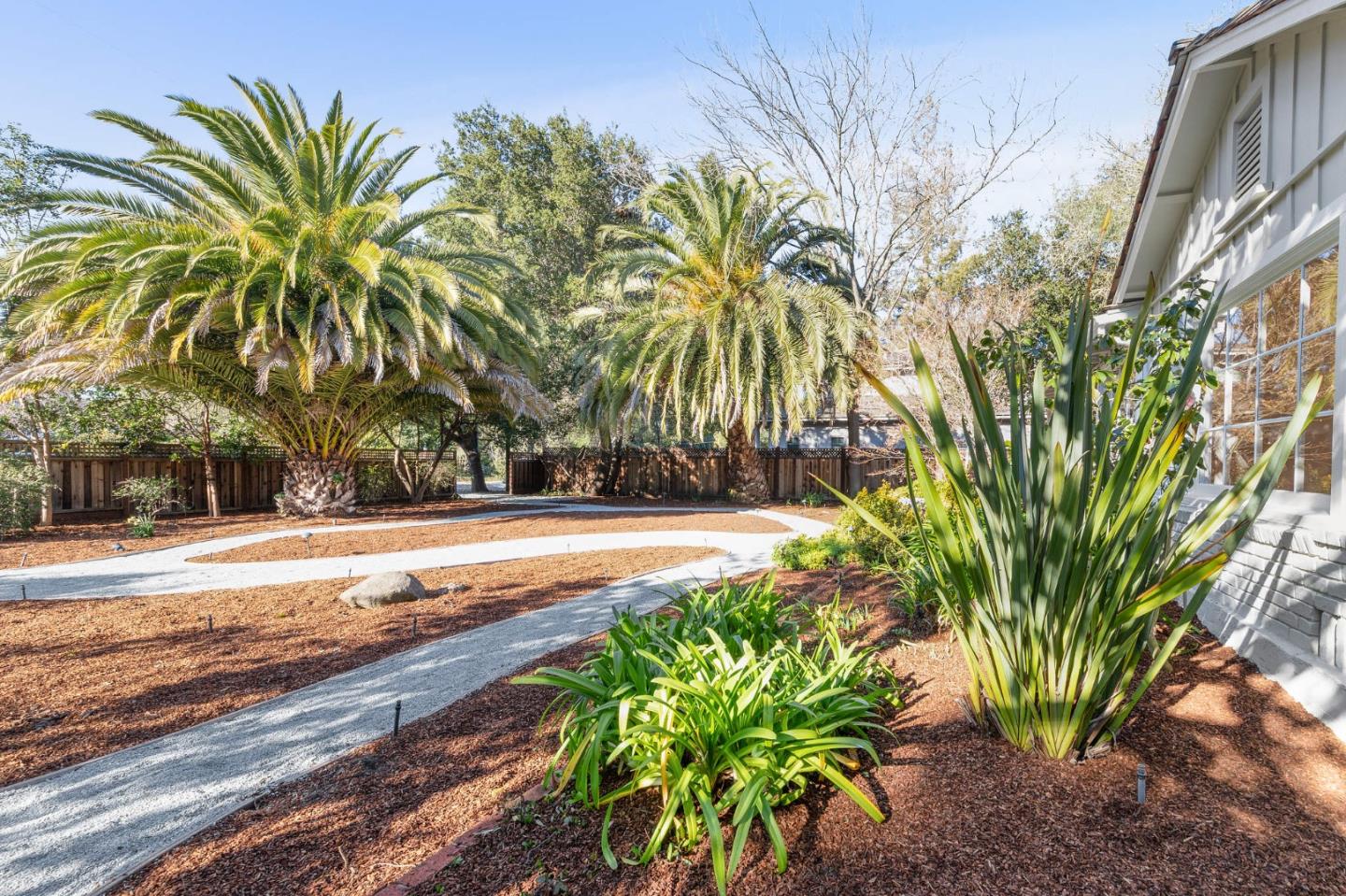 94 Palmer Lane Atherton, CA 94027 - Photo 2 of 10 a view of a yard with palm trees
