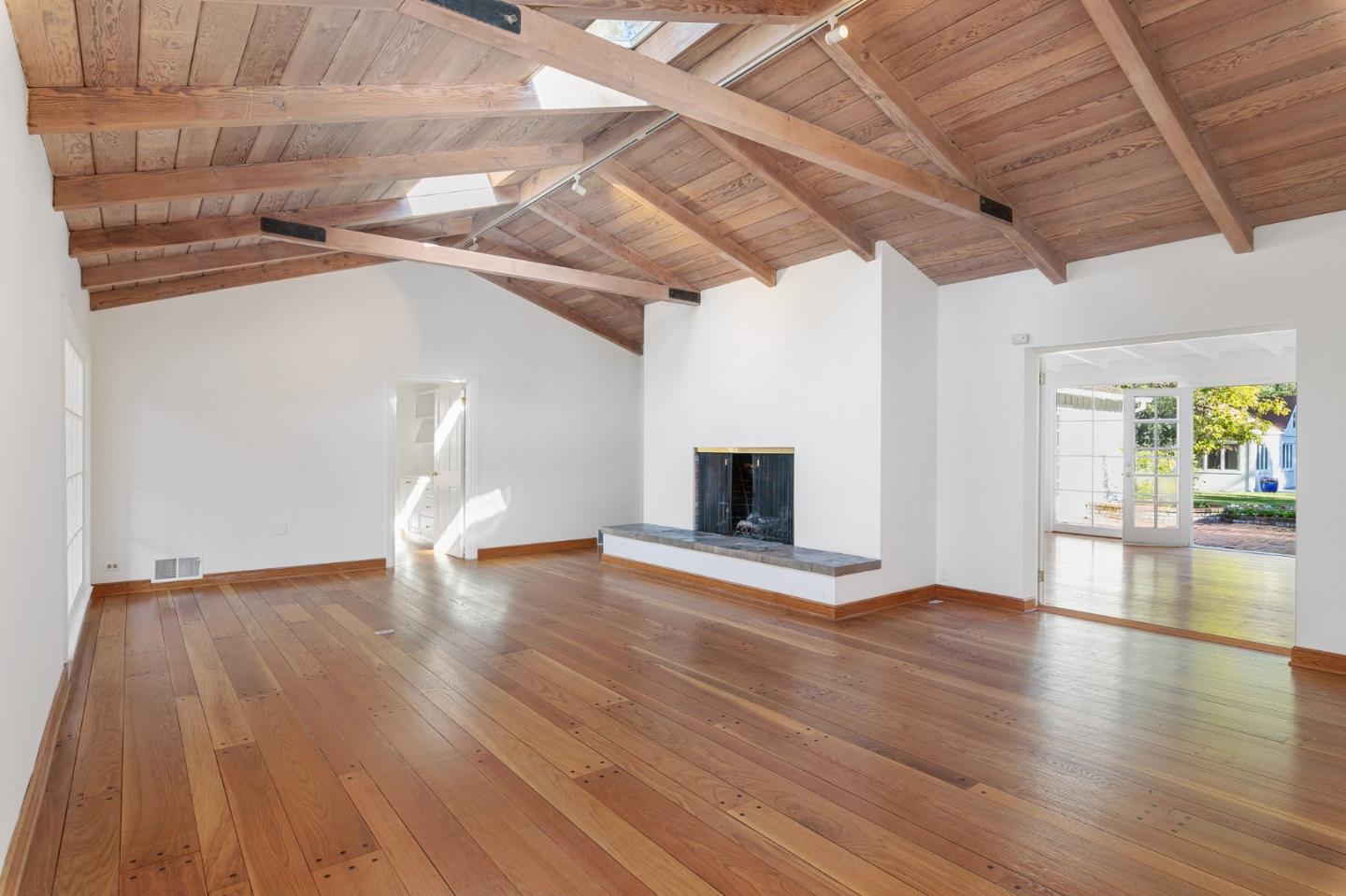 94 Palmer Lane Atherton, CA 94027 - Photo 3 of 10 a view of empty room with wooden floor
