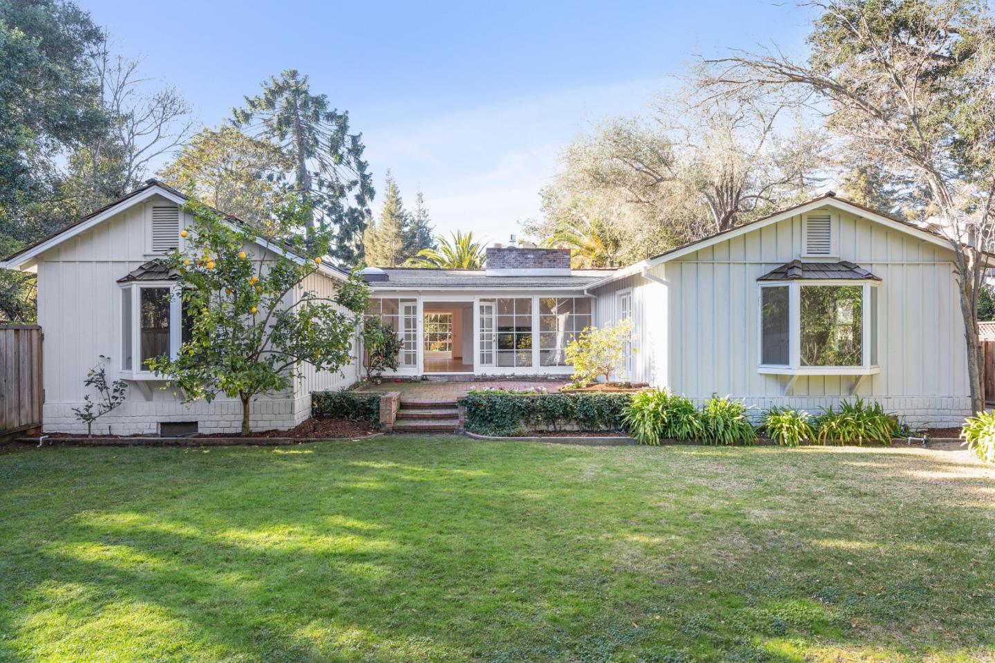 94 Palmer Lane Atherton, CA 94027 - Photo 6 of 10 a front view of house with yard and green space