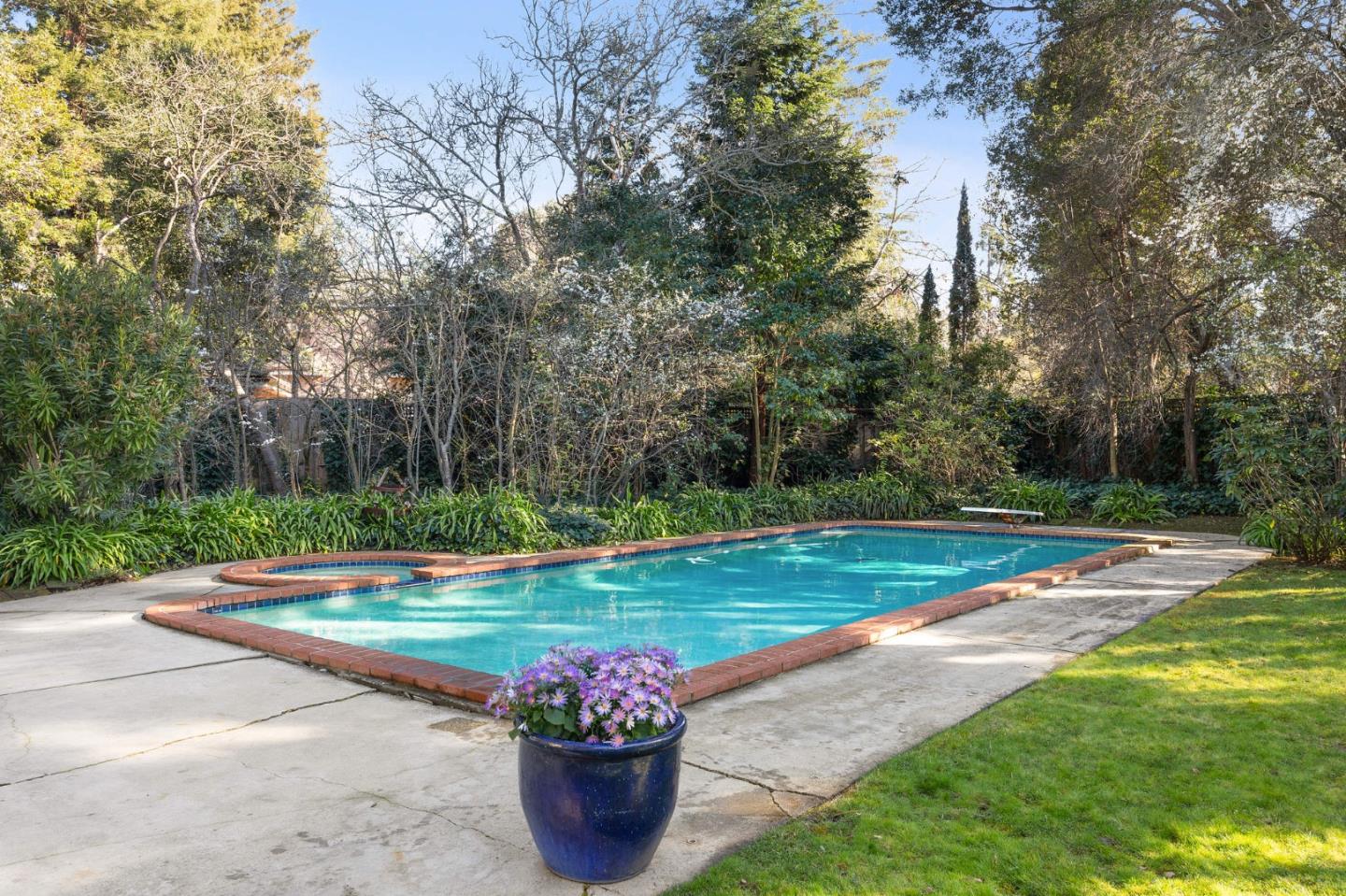 94 Palmer Lane Atherton, CA 94027 - Photo 10 of 10 a view of a backyard with potted plants and large trees