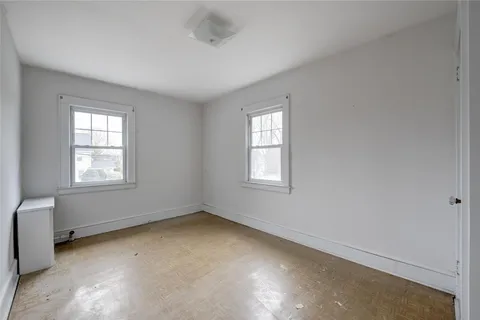 an empty room with windows