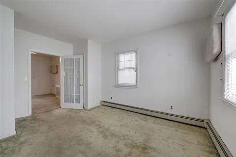 an empty room with windows