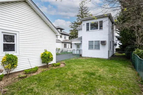 a house with garden in front of it