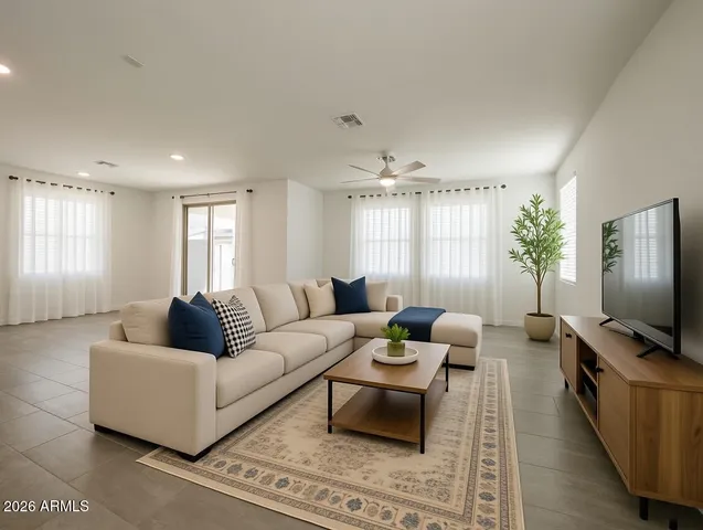 a view of a kitchen with a sink and a refrigerator