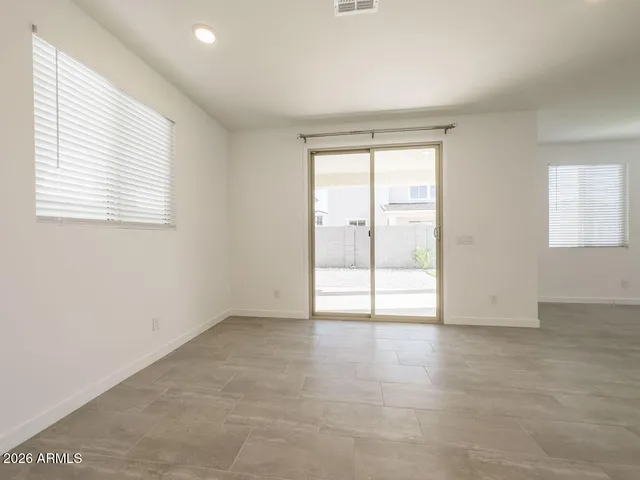 a kitchen with stainless steel appliances a refrigerator sink and microwave