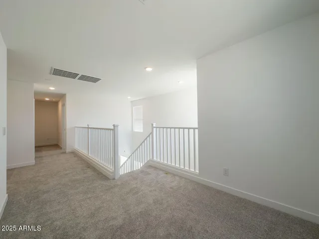 a view of an entryway with hallway