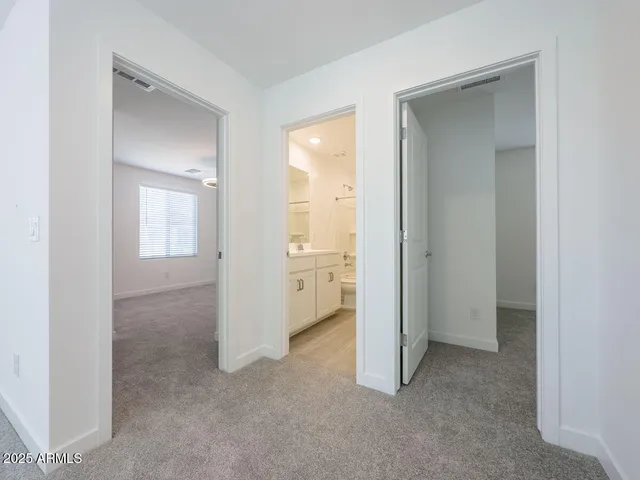 en empty room with windows