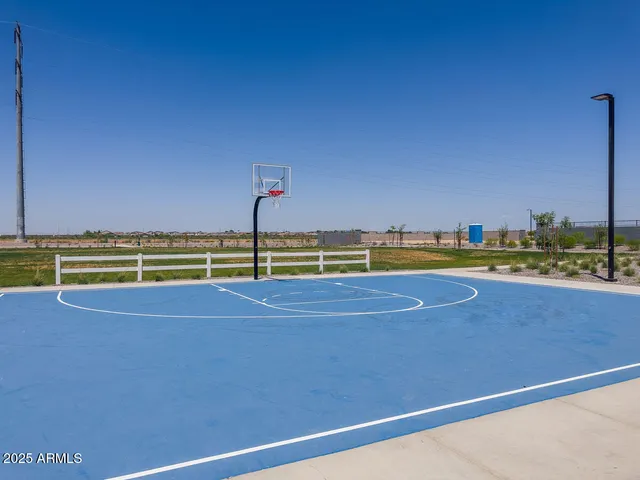 a view of a swimming pool and an outdoor space