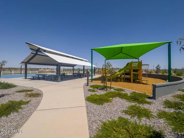 a outdoor space with lots of white furniture
