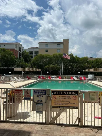 a view of a street with a tree