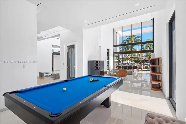 a bathroom with a bathtub shower sink and a shower
