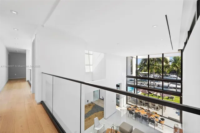 a spacious bathroom with a double vanity sink and a large mirror