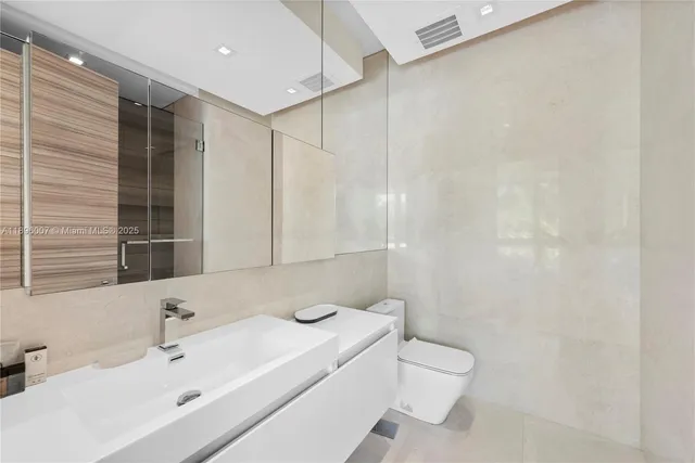 a kitchen with a stove and a refrigerator