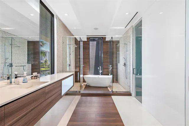 a bathroom with a sink and a shower