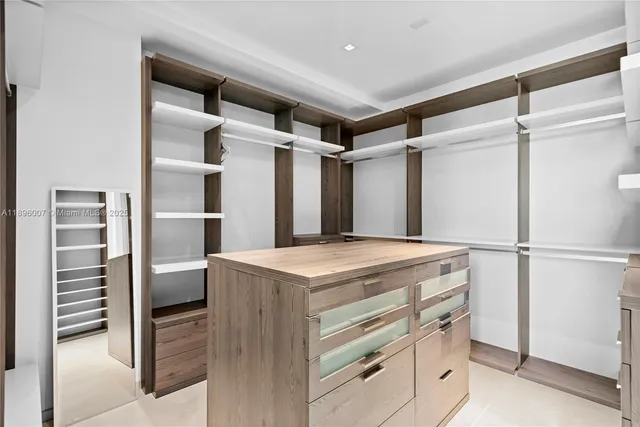 a living room with furniture large window and flat screen tv