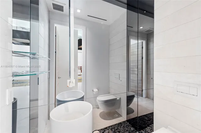 $6,900,000 | 418 Sunset Drive, Hallandale Beach, FL 33009