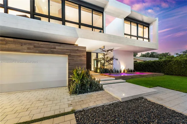 a swimming pool with outdoor seating and yard
