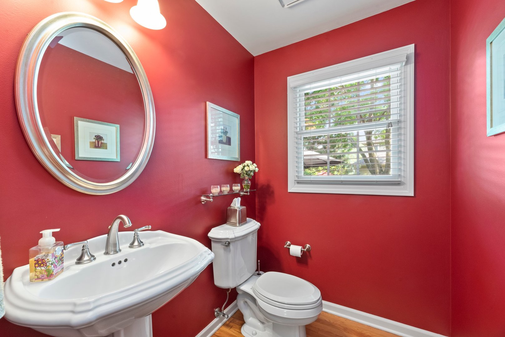 1620 Grommon Road Naperville, IL 60564 - Photo 17 of 53 a bathroom with a toilet a sink and a mirror