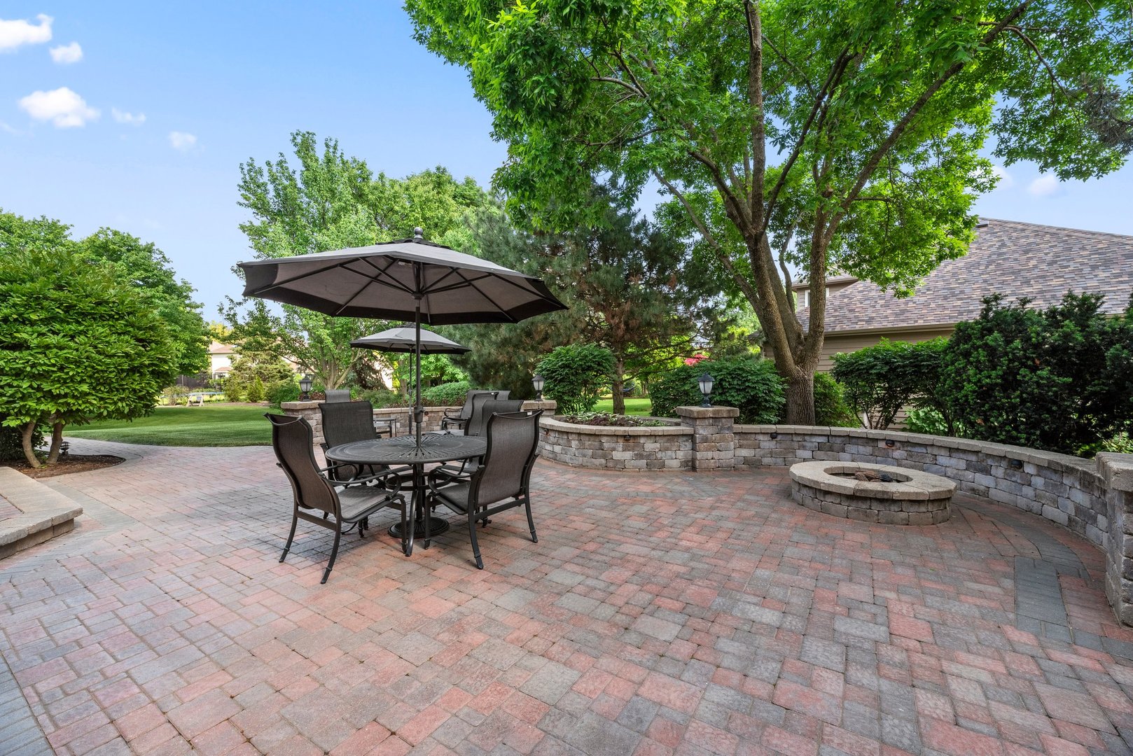 1620 Grommon Road Naperville, IL 60564 - Photo 36 of 53 a view of a backyard with sitting area and furniture