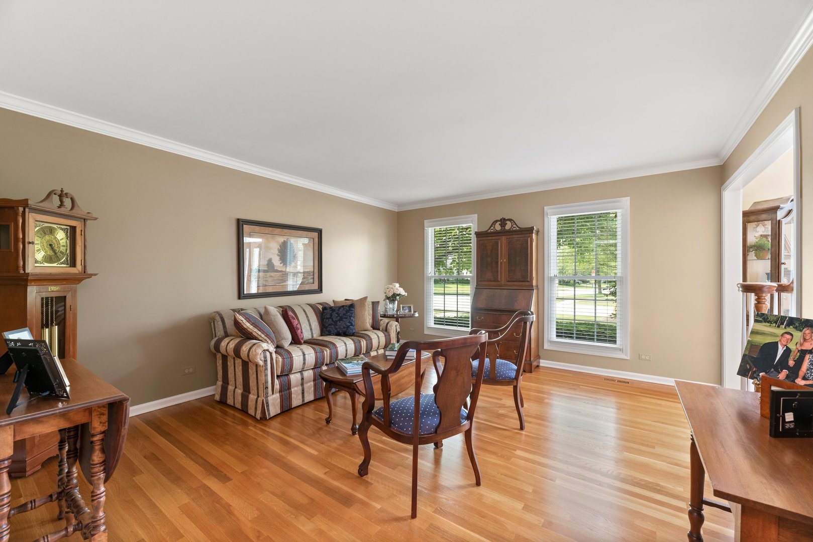 1620 Grommon Road Naperville, IL 60564 - Photo 5 of 53 a view of a dining room with furniture and wooden floor