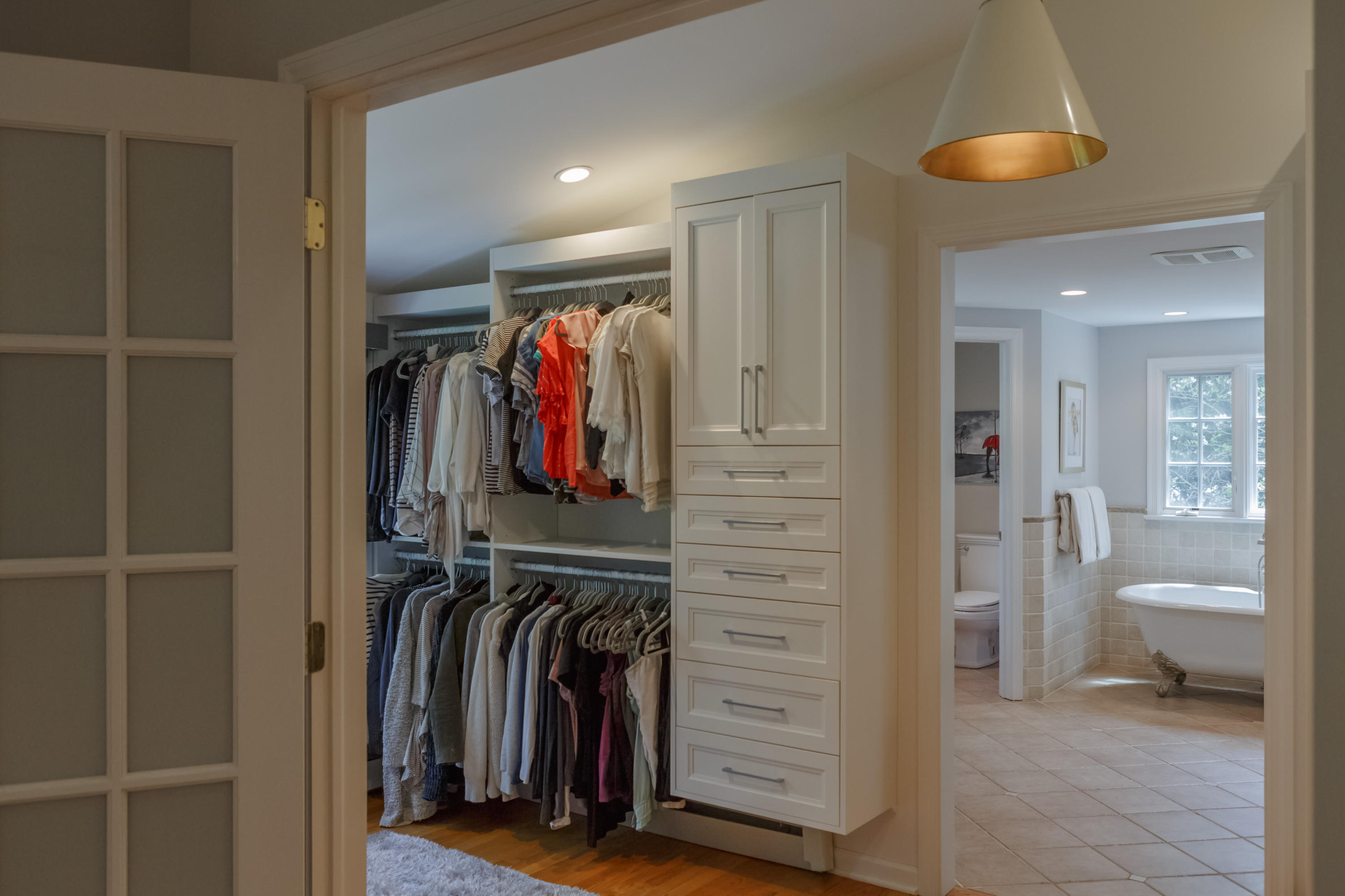 466 Mansfield Avenue Darien, CT 06820 - Photo 24 of 46 a view of walk in closet with clothes and shoes