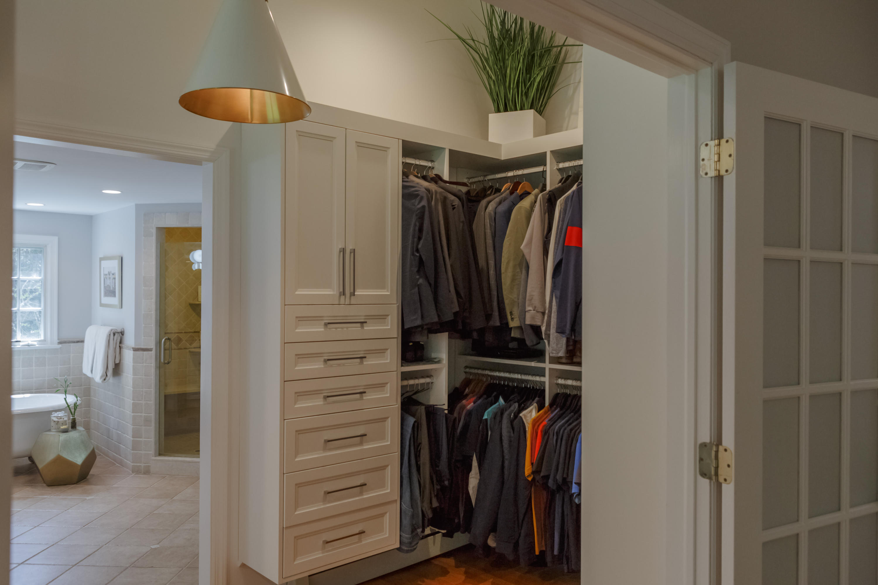 466 Mansfield Avenue Darien, CT 06820 - Photo 25 of 46 a view of walk in closet with clothes and shoes