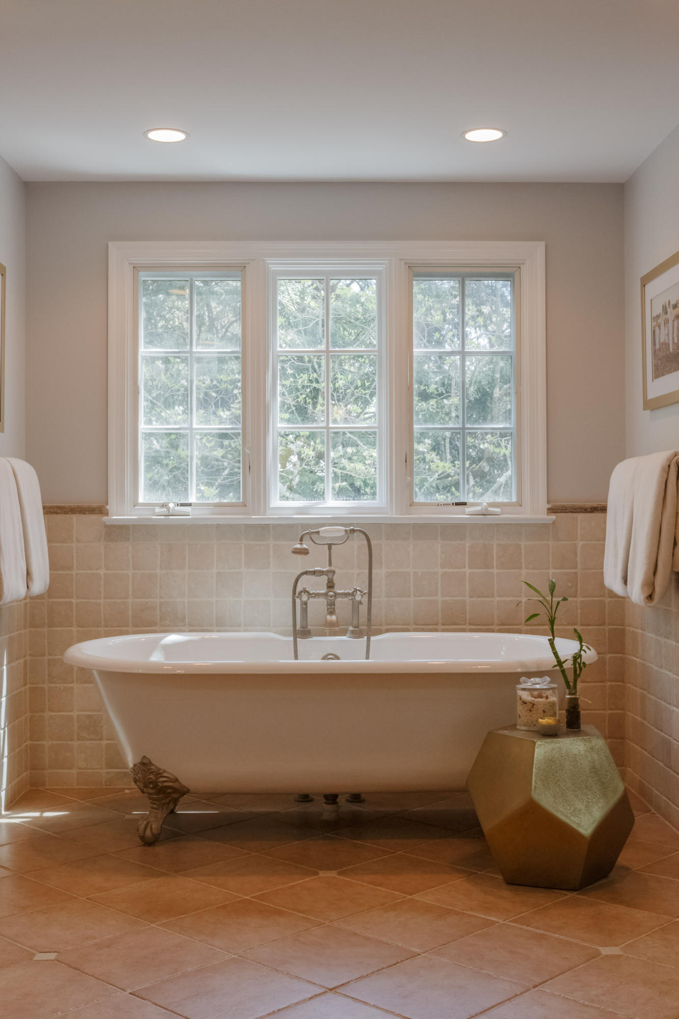 466 Mansfield Avenue Darien, CT 06820 - Photo 27 of 46 a bathroom with a tub a sink and a window