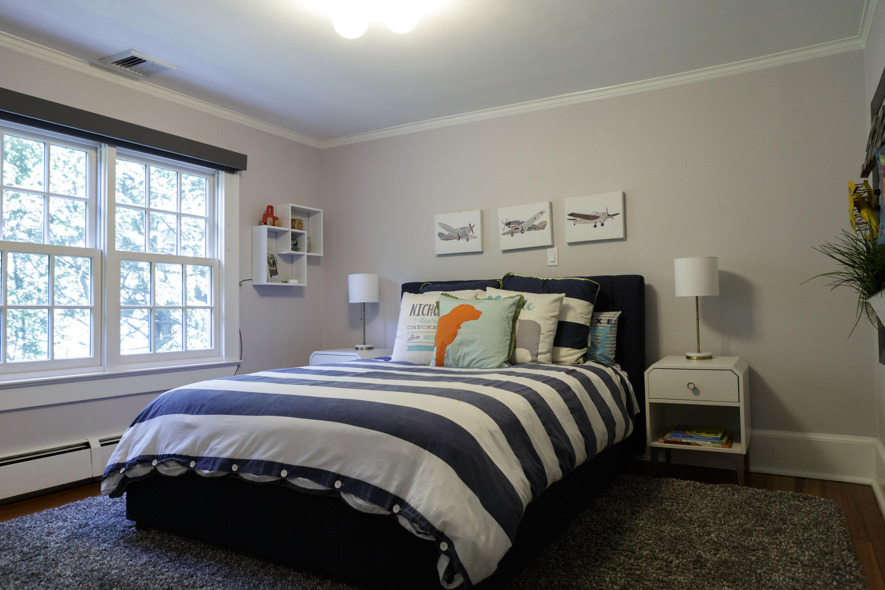 466 Mansfield Avenue Darien, CT 06820 - Photo 29 of 46 a bedroom with a bed and a window