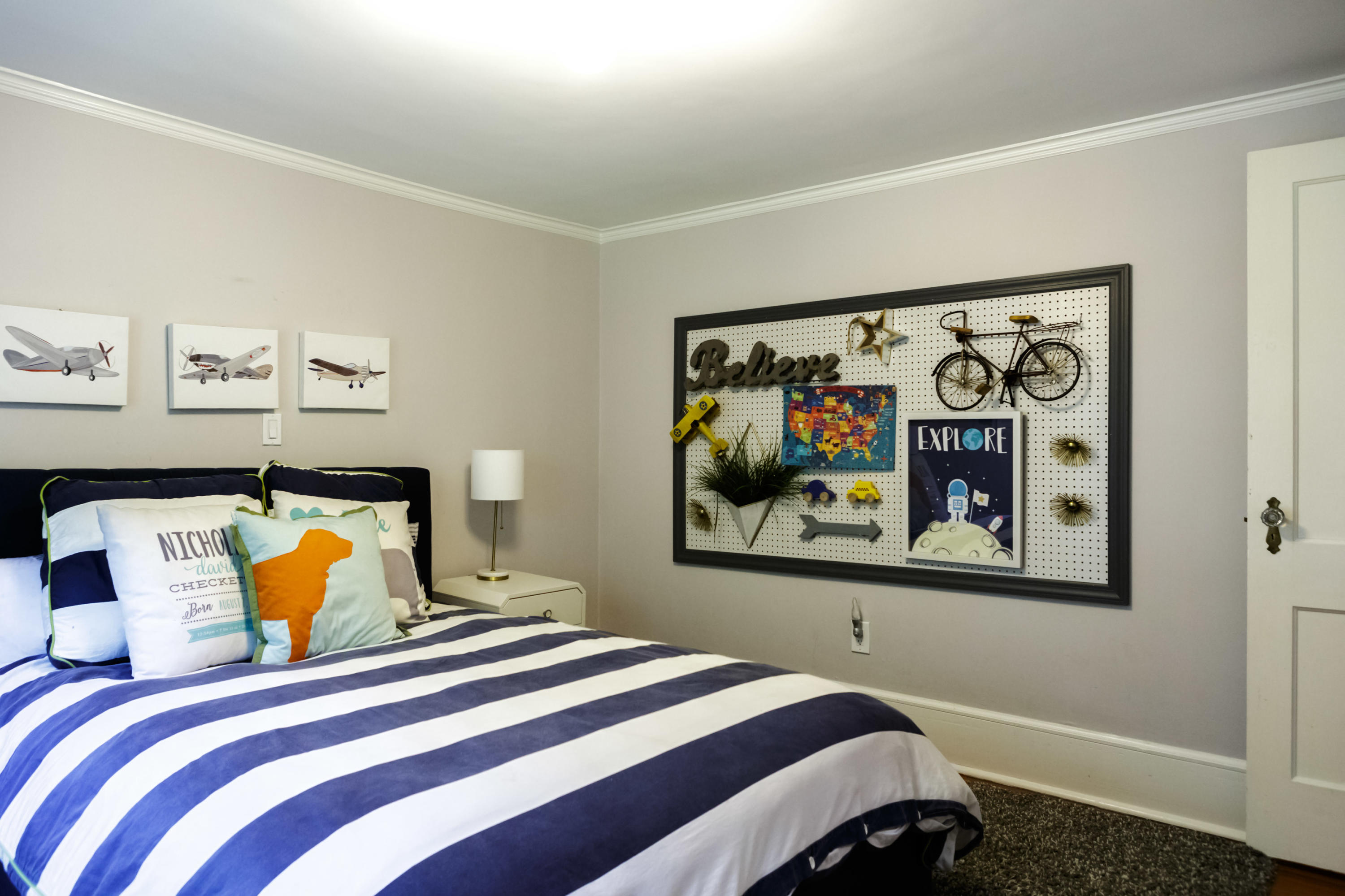 466 Mansfield Avenue Darien, CT 06820 - Photo 30 of 46 a bedroom with bed and painting on the wall