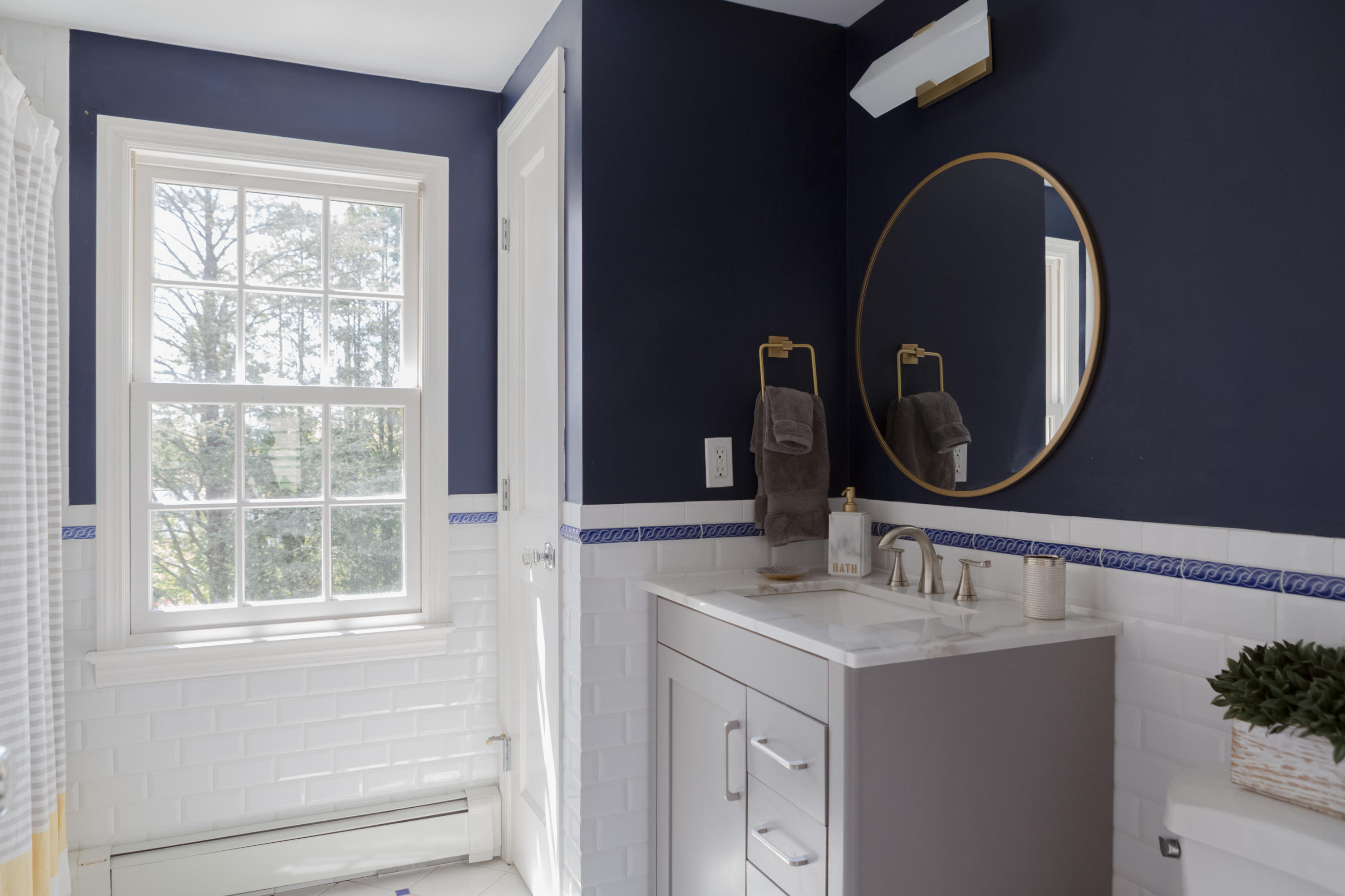 466 Mansfield Avenue Darien, CT 06820 - Photo 37 of 46 a bathroom with a sink and a mirror