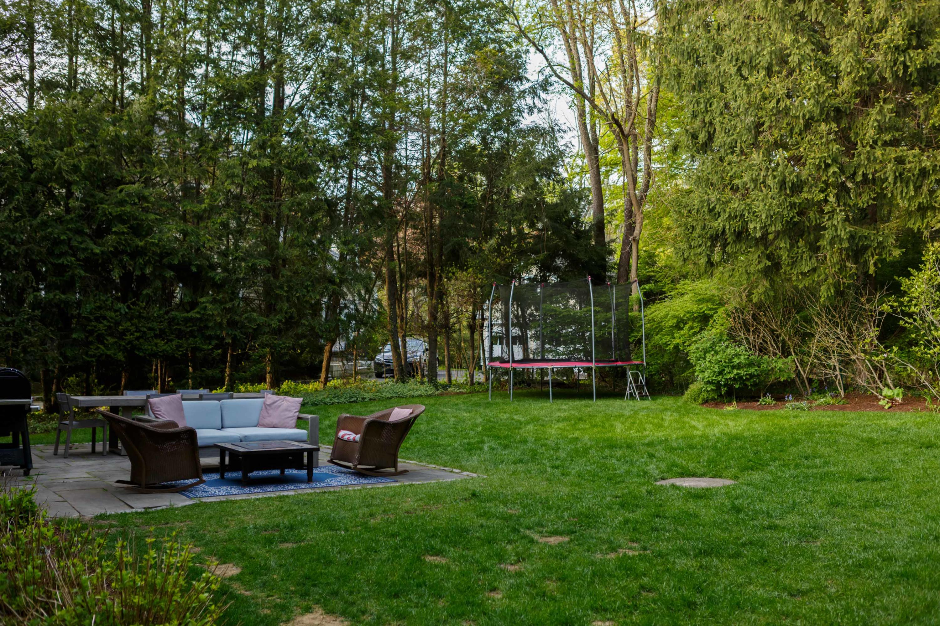 466 Mansfield Avenue Darien, CT 06820 - Photo 45 of 46 a view of a backyard with sitting area