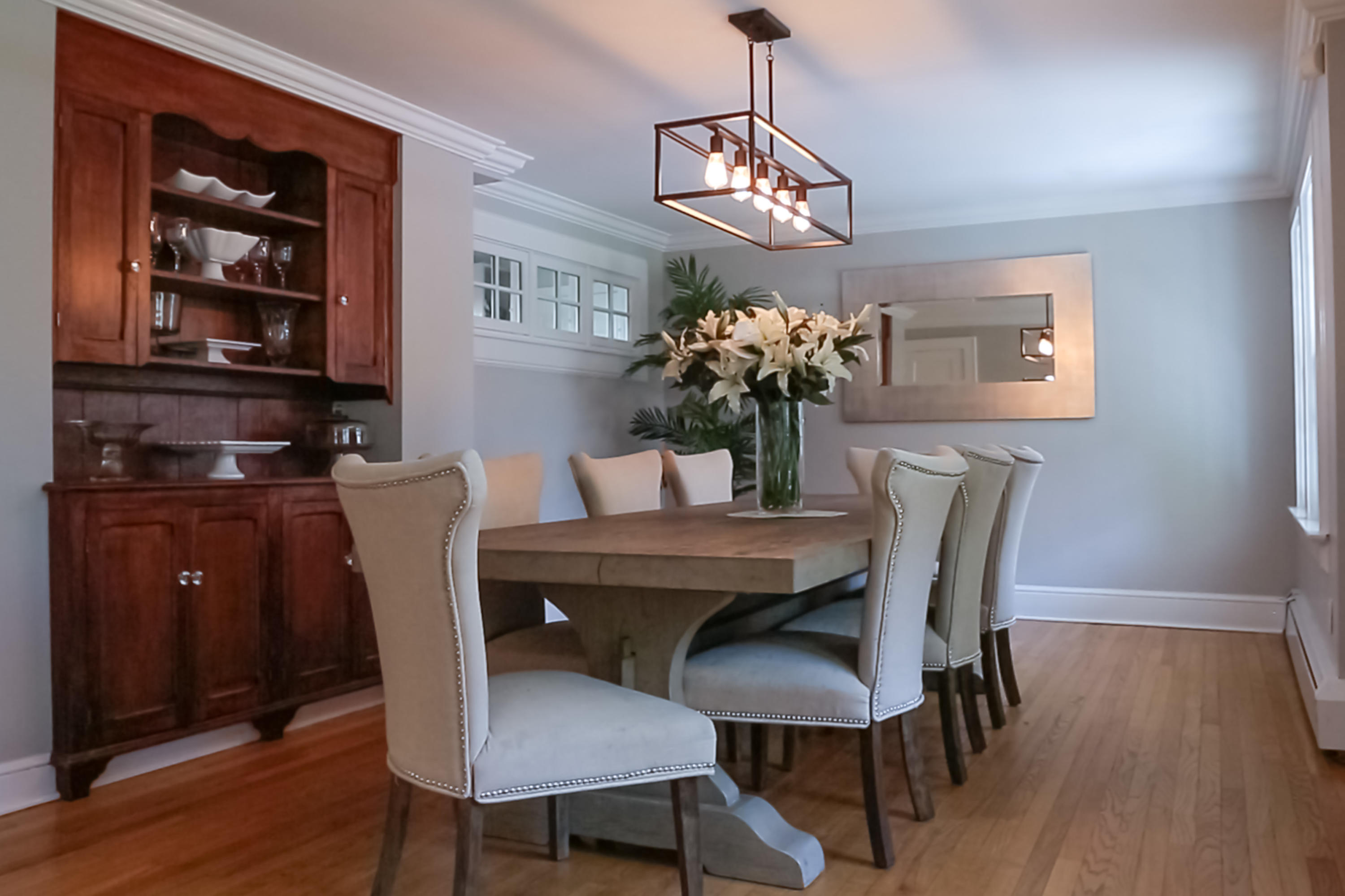 466 Mansfield Avenue Darien, CT 06820 - Photo 9 of 46 a view of a dining room with furniture wooden floor and chandelier
