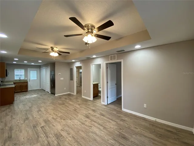 a view of a livingroom with a ceiling fan