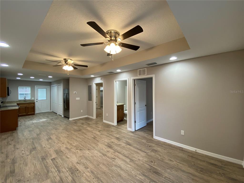 8950 North Mendoza Way Citrus Springs, FL 34434 - Photo 12 of 35 a view of a livingroom with a ceiling fan