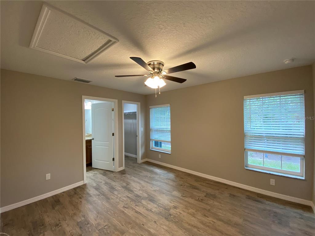8950 North Mendoza Way Citrus Springs, FL 34434 - Photo 24 of 35 a view of an empty room with a window