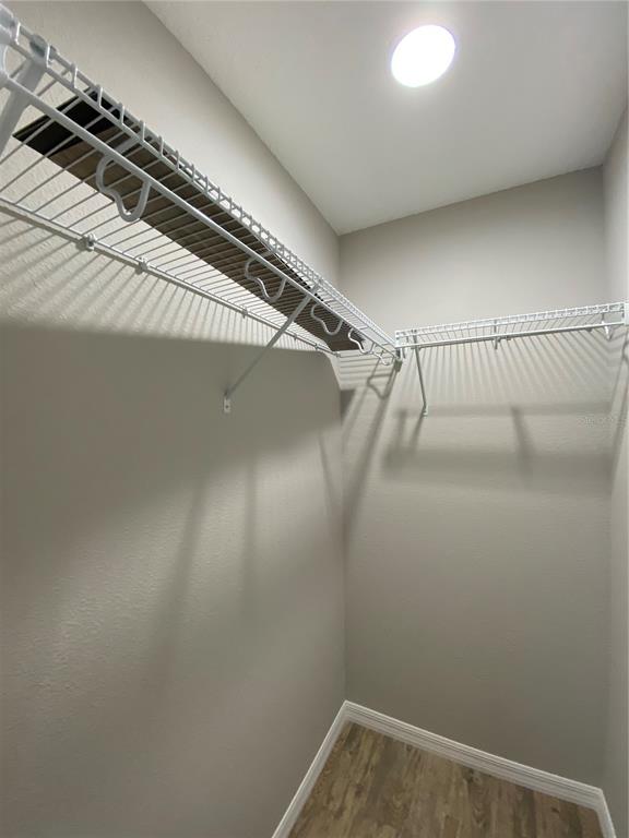 8950 North Mendoza Way Citrus Springs, FL 34434 - Photo 30 of 35 a view of a room with racks on the wall