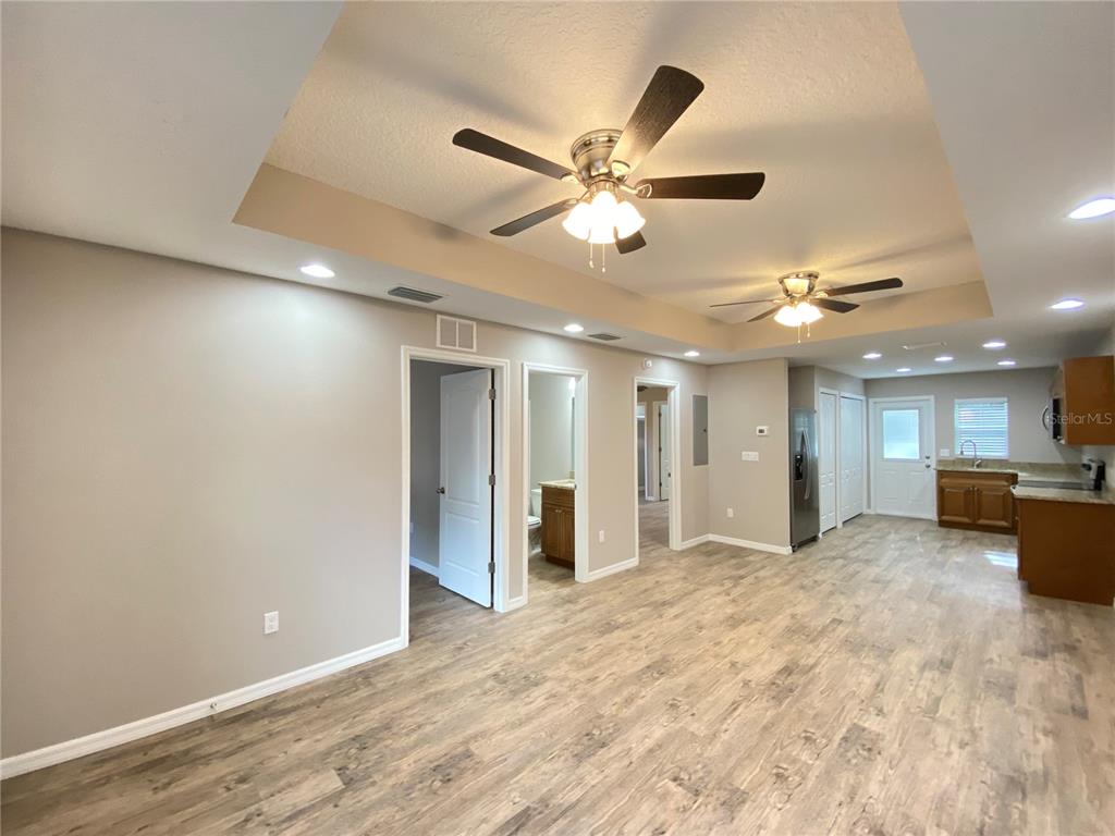 8950 North Mendoza Way Citrus Springs, FL 34434 - Photo 7 of 35 a view of a livingroom with a kitchen