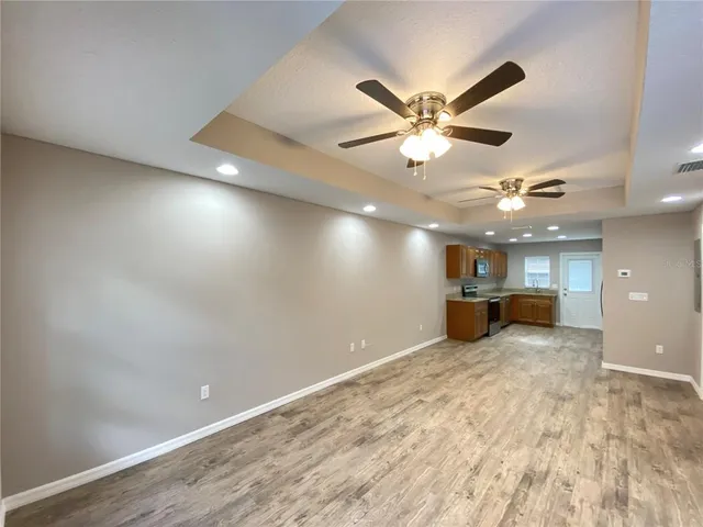 a view of a livingroom with a ceiling fan
