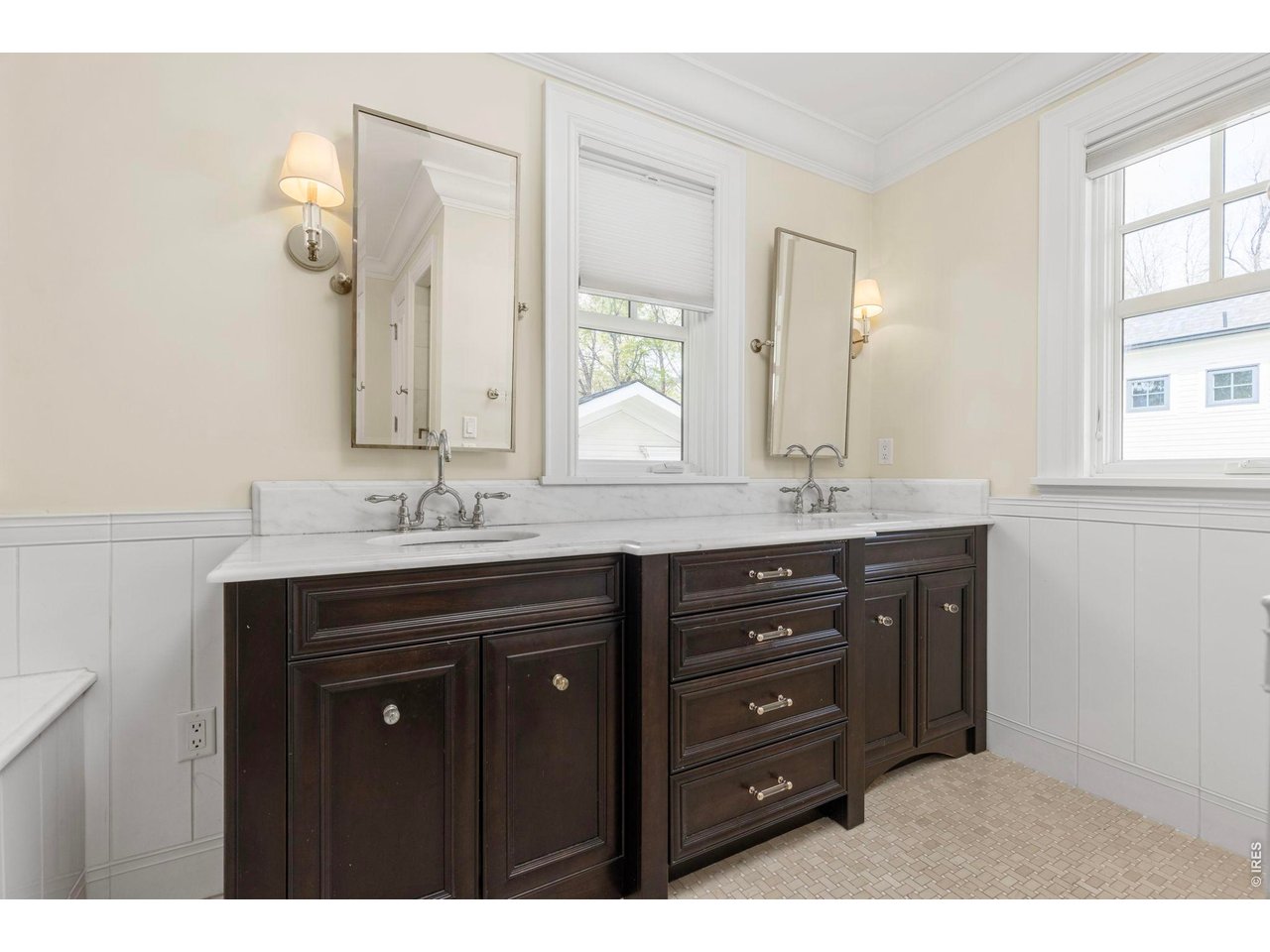 3181 9th Street Boulder, CO 80304 - Photo 27 of 49 a bathroom with a granite countertop double vanity sink and mirror