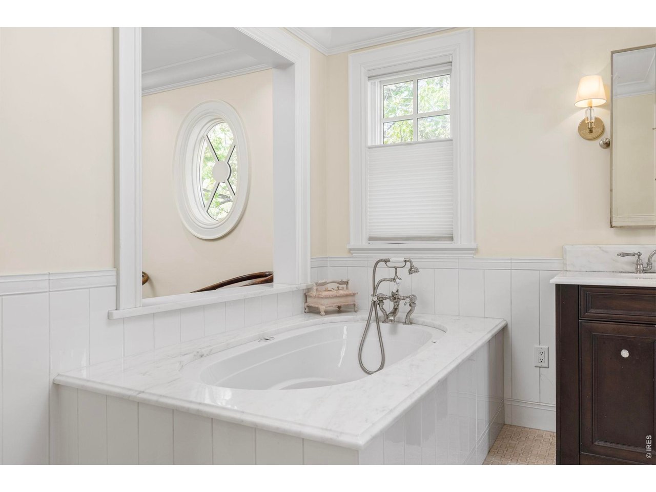 3181 9th Street Boulder, CO 80304 - Photo 29 of 49 a bathroom with a sink and a mirror
