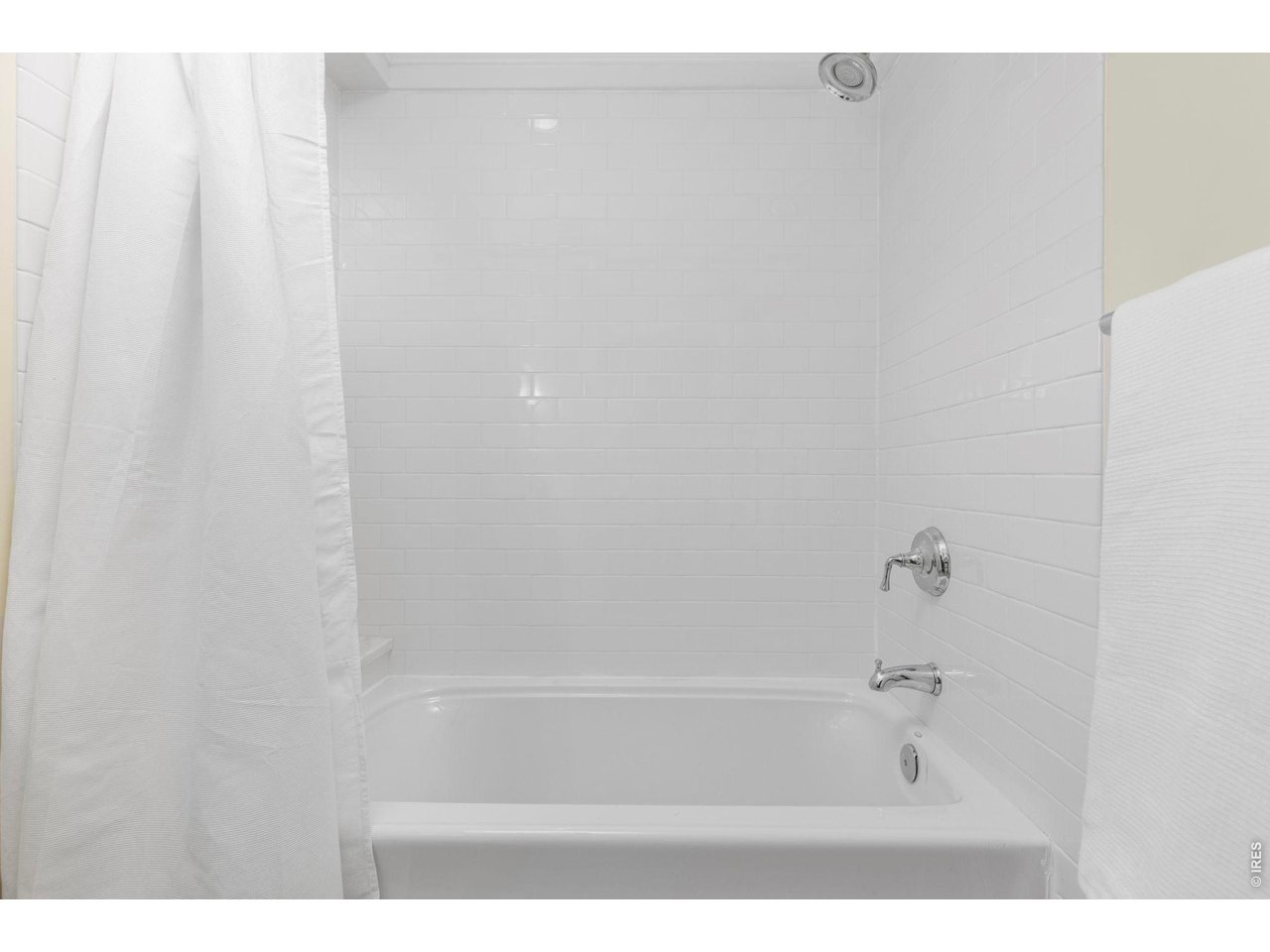 3181 9th Street Boulder, CO 80304 - Photo 35 of 49 a bathroom with a bathtub