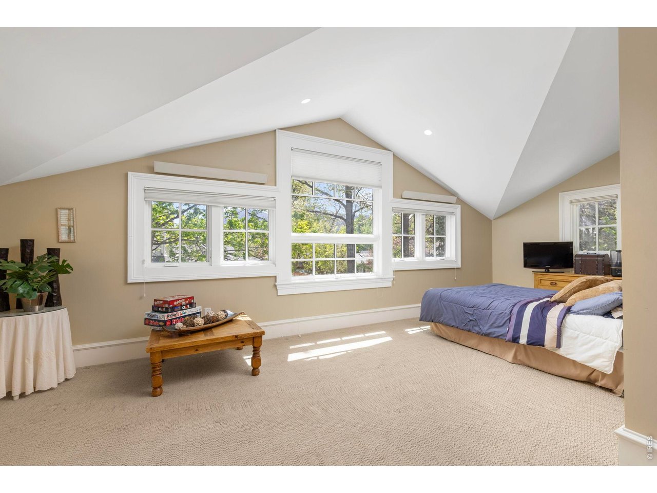 3181 9th Street Boulder, CO 80304 - Photo 39 of 49 a bedroom with furniture and a window