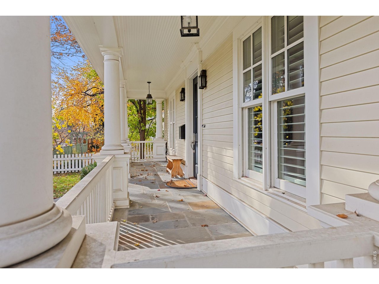 3181 9th Street Boulder, CO 80304 - Photo 6 of 49 a view of a balcony with wooden floor and windows