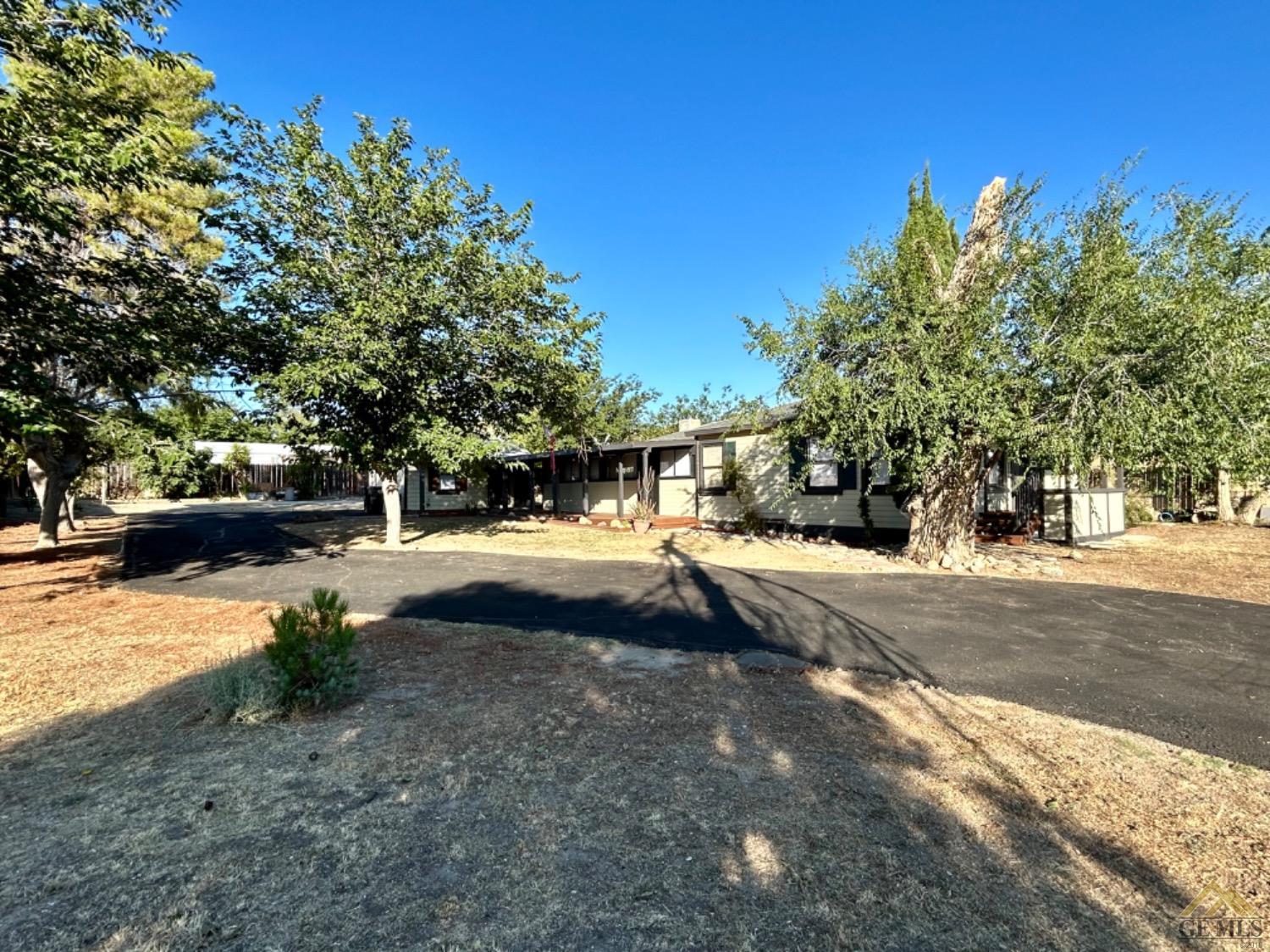 a view of road with trees