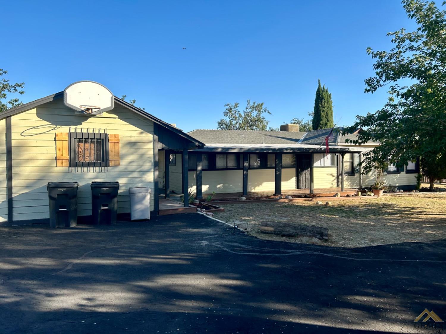 Undisclosed Address Maricopa, CA 93252 - Photo 11 of 32 a view of a house with a yard